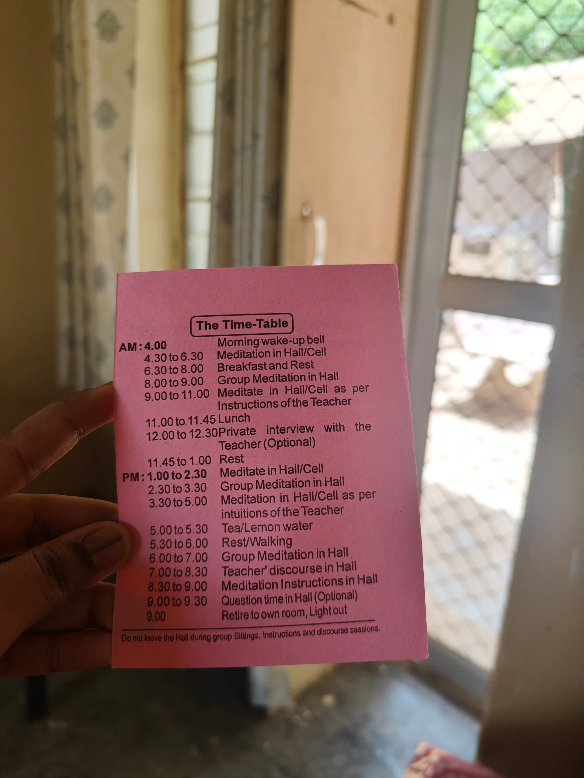 Printed daily timetable for the ten-day Vipassana course