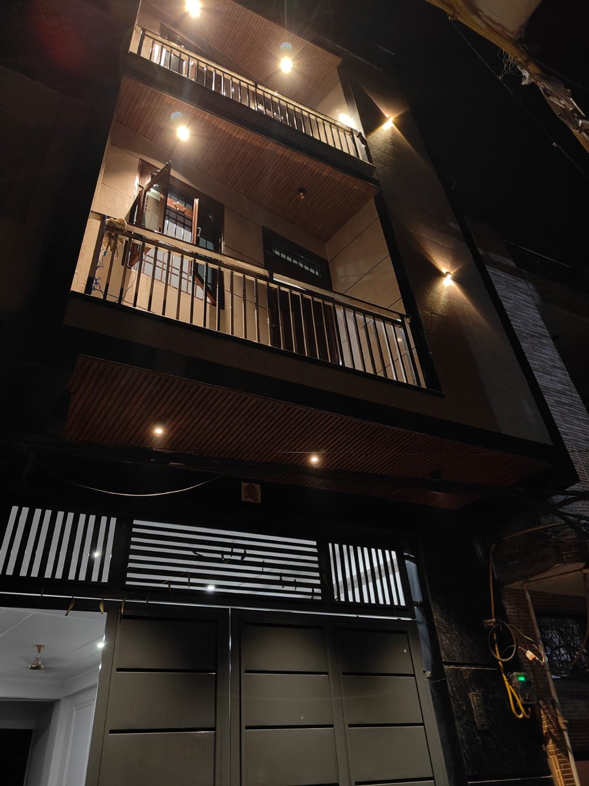 The completed multi-storey family home built on the same land
